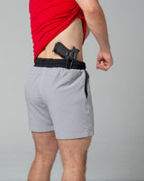 Holster close up on grey training shorts right side
