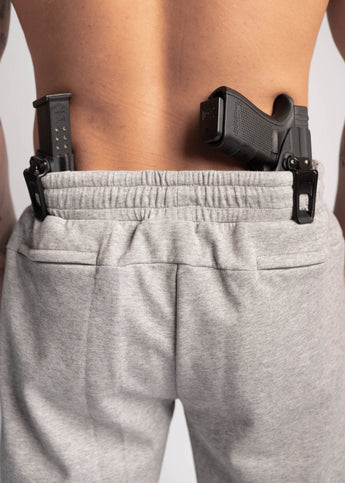 Green sweatpants back concealed carry