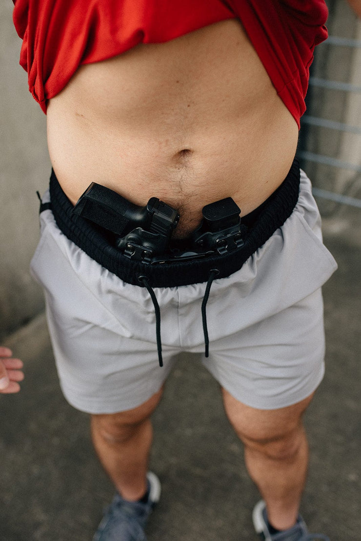 Black mag carrier with grey training shorts front