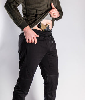 Black joggers front with gun