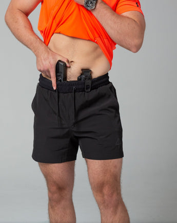 Black training shorts front concealed carry