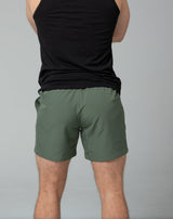 Green training shorts back