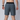 A model wearing dark grey training shorts shown from behind