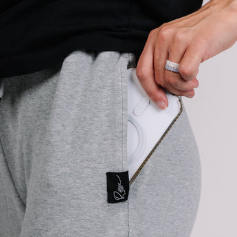 Grey Rose Carrier Joggers left pocket and logo close up