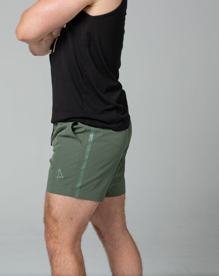 Green training shorts left side