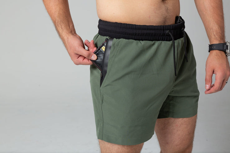 Green training shorts right side pocket 