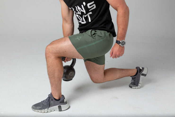 Green training shorts split squat 